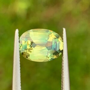 2.12 carat Yellowish Green/Green Oval Cut Natural Bi-Color Sapphire